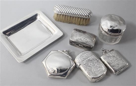 An American sterling silver miniature tray and six other small silver items including vesta case and stamp case.